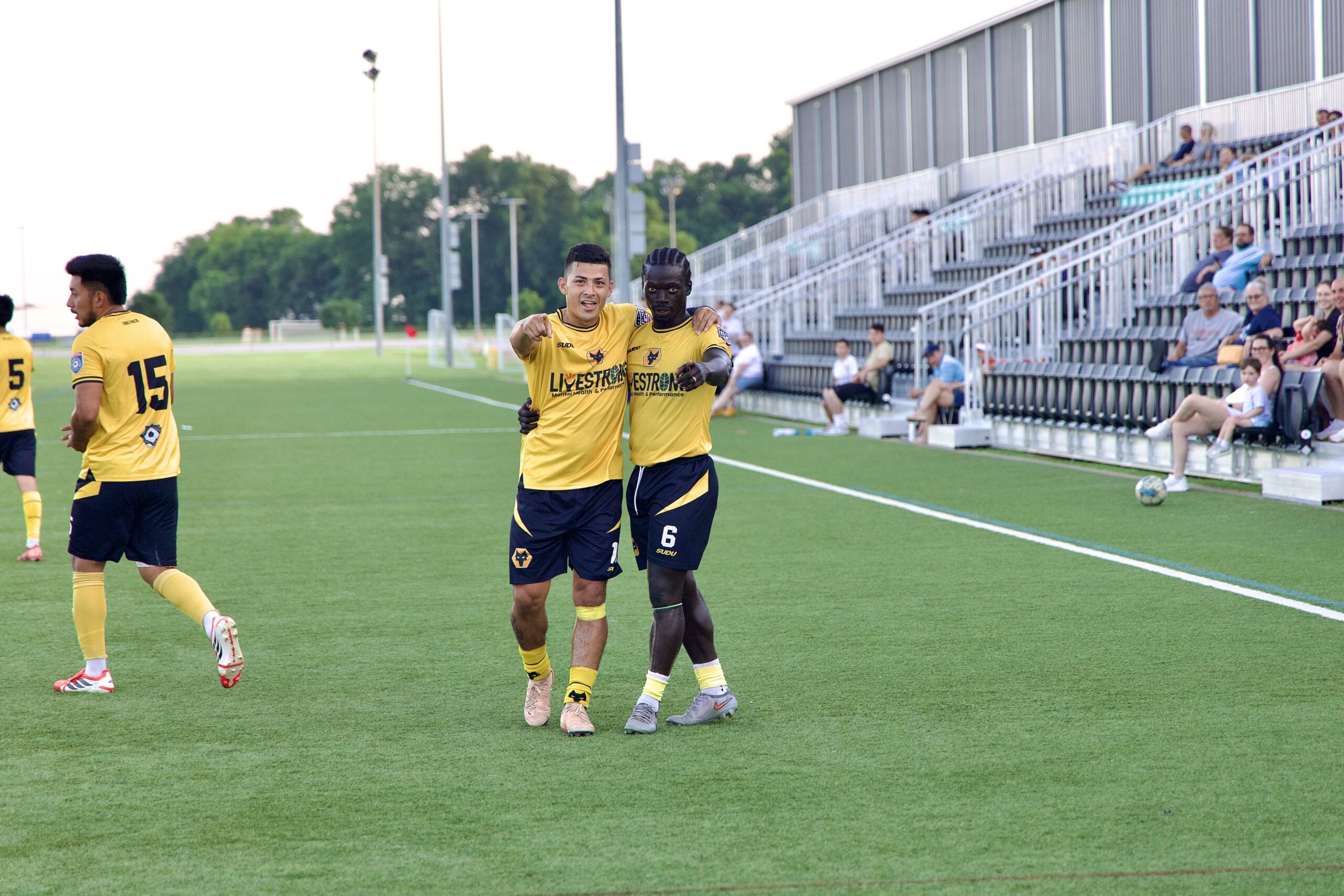 Arkansas Wolves players competing in Wolves yellow